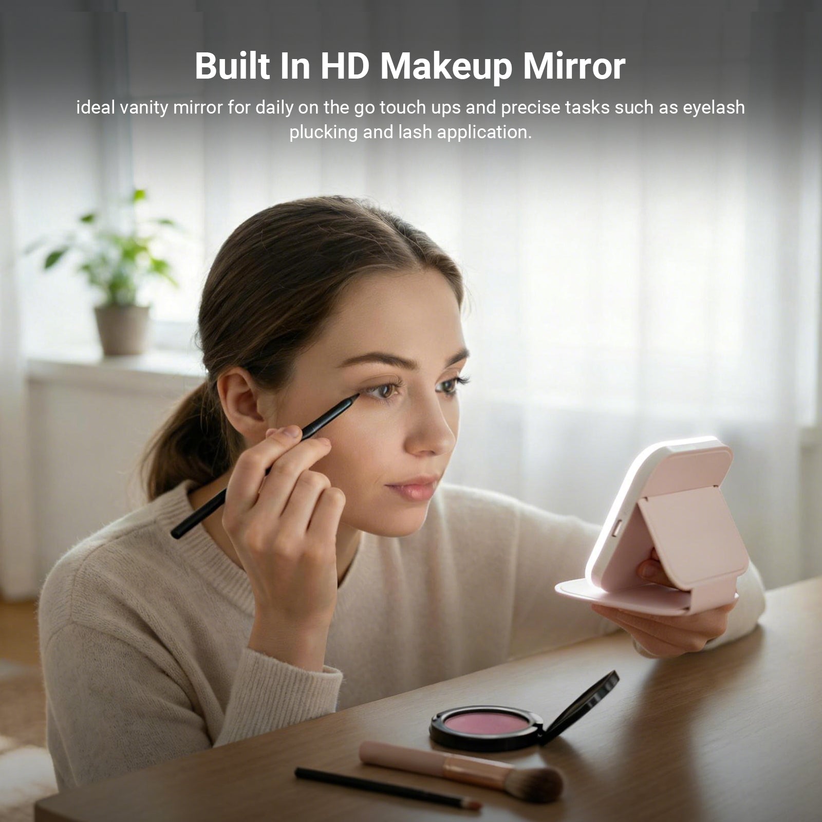 The girl used the NEEWER N26 4.4" Compact LED Lighted Travel Makeup Mirror while drawing her eyebrows