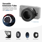 The spring loaded tube keeps the lens further from the camera sensor and increases magnification while preserving image quality